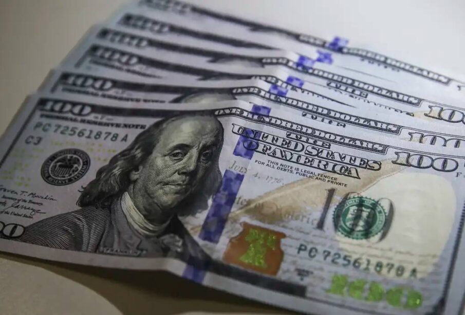 Dólar forte ações: como mercado reage e quais ganham